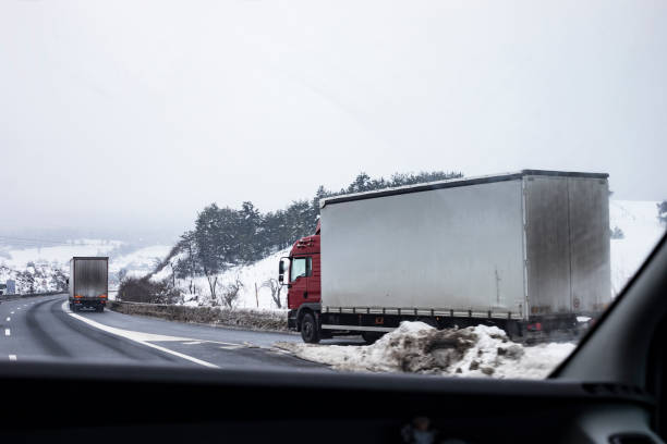 istock Semi-truck Transportation on Highway in Winter 917421022