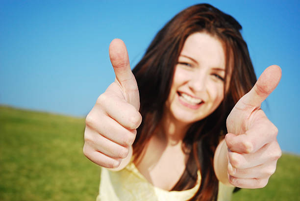 istock Young woman giving a thumbs up! 91742152