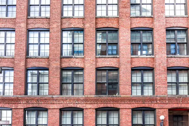 Photo of Pattern of brick glass window building in Brooklyn, NYC, New York City, front exterior grunge old architecture