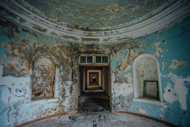 istock Old ruined abandoned mansion, interior of round hall 917428176