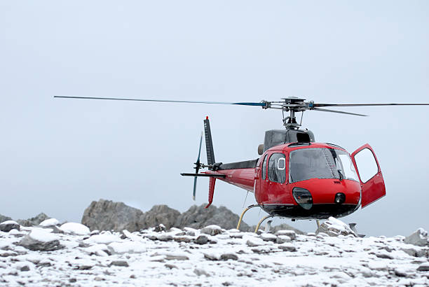 istock rescue helicopter landing on the mountain 91742853
