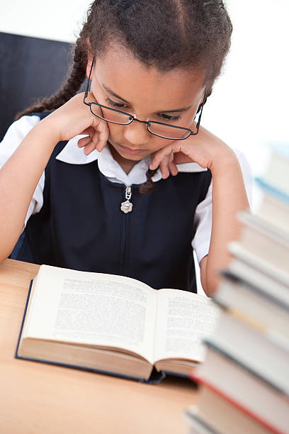 istock Pretty Young School Girl Reading A Book 91742926