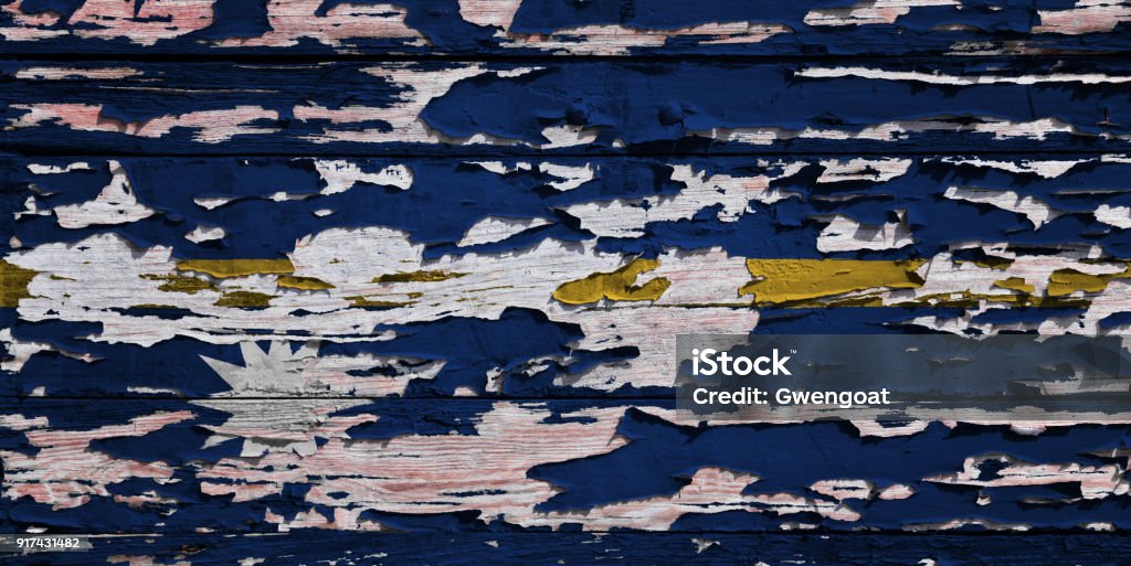 Flag of Nauru painted on a grunge plank Flag of Nauru painted on a grunge wooden board. Backgrounds Stock Photo