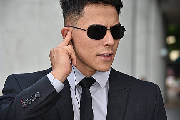 istock Listening Diverse Security Guard Wearing Sunglasses 917432070