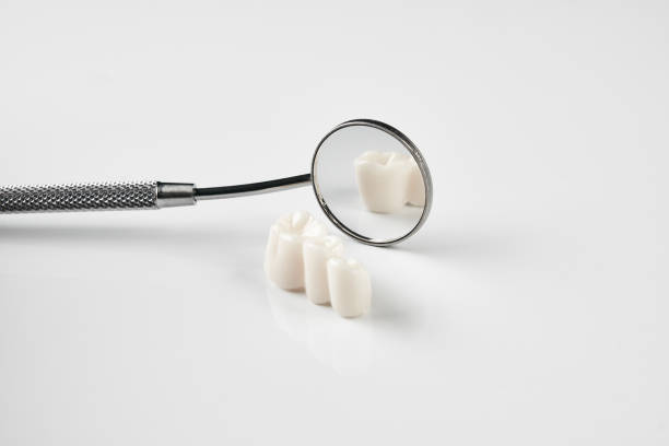 istock Removed dental teeth and dentistry instruments 917436994