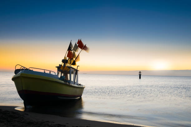 istock Fishing boat on the Baltic shore 2 917438464