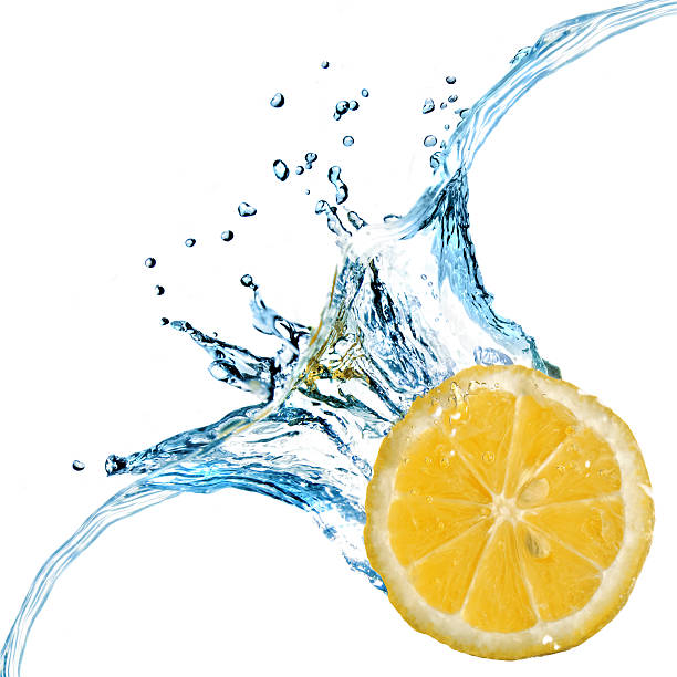 istock Fresh lemon dropped into water with splash isolated on white 91743994