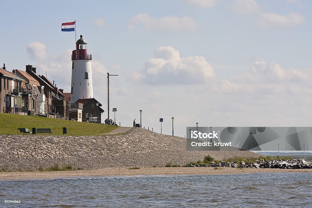 Frente al mar con Faro - Foto de stock de Aerogenerador libre de derechos