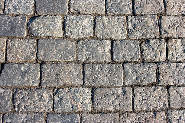 Stone gray block paving background stock photo