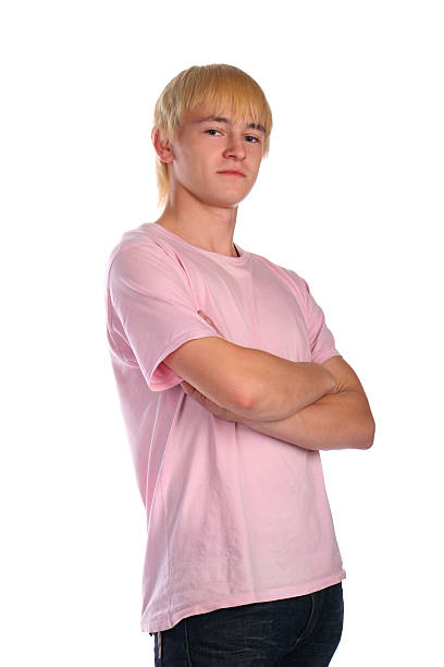 Young man in pink shirt stock photo