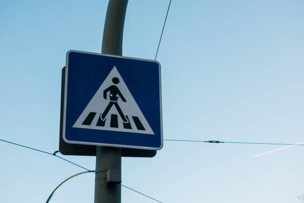 istock blue pedestrians crossing sign 917444434