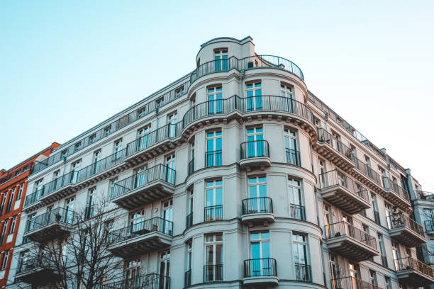 istock white and curved corner building with beautiful stucco facade 917445320