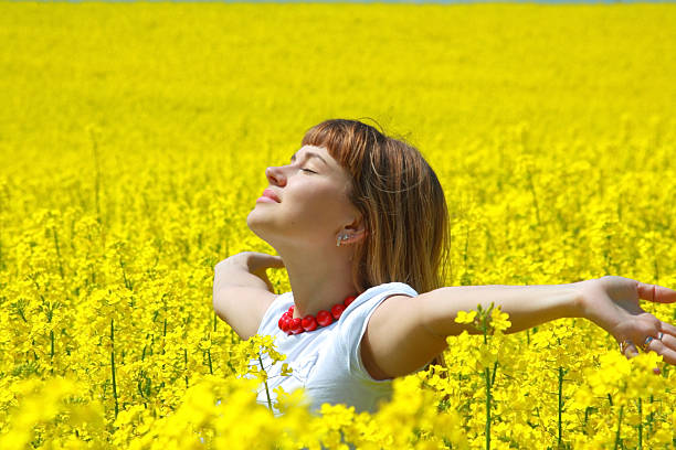 istock Relaxing girl in the rapeseed field 91744579