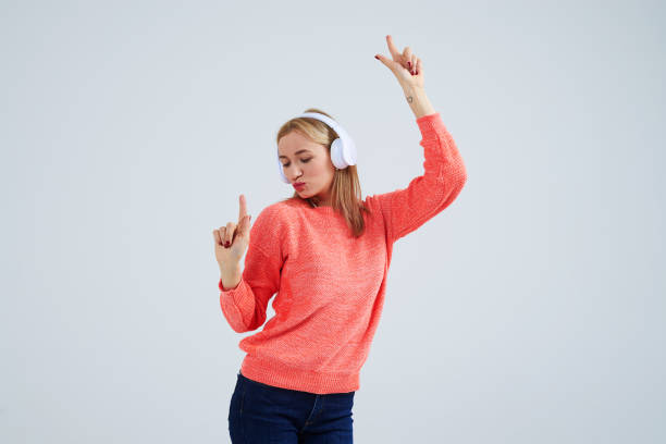 istock young blond dancing in headphones 917448274