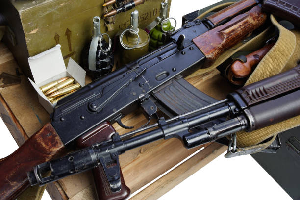 army box of ammunition with AK47 rifle and ammunition army box of ammunition with AK47 rifle and ammunition isolated ak 47 bullets stock pictures, royalty-free photos & images