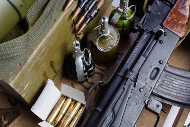 istock army box of ammunition with AK47 rifle and ammunition 917458276