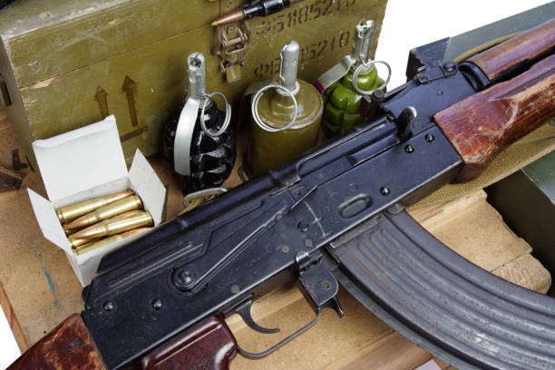 istock army box of ammunition with AK47 rifle and ammunition 917458312