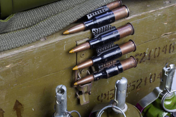 istock army box of ammunition with AK47 rifle and ammunition 917458340