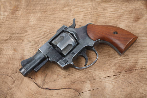 istock Revolver on the wooden table 917458516