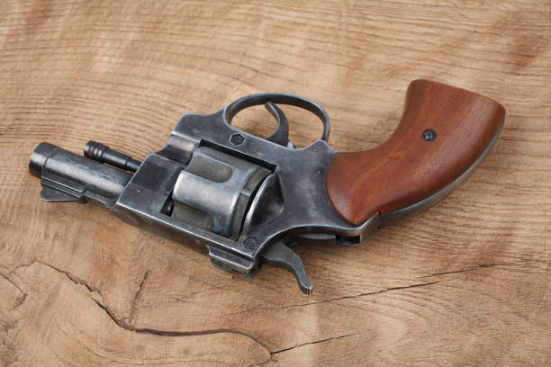istock Revolver on the wooden table 917458672