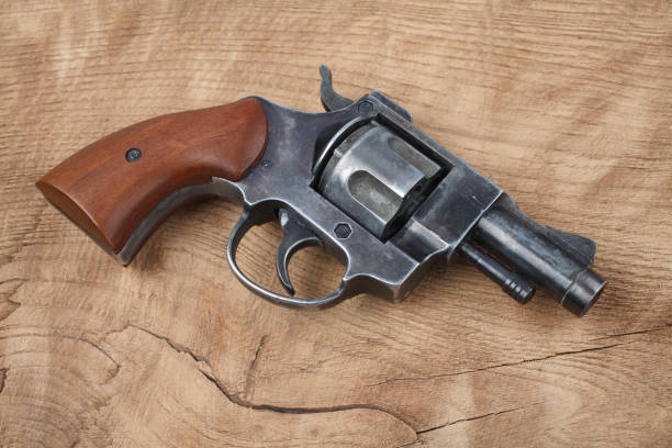 istock Revolver on the wooden table 917458726
