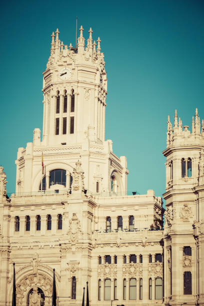 Majestic Cibeles palace serving as Madrid city hall at plaza de Cibeles under cloudy skies.