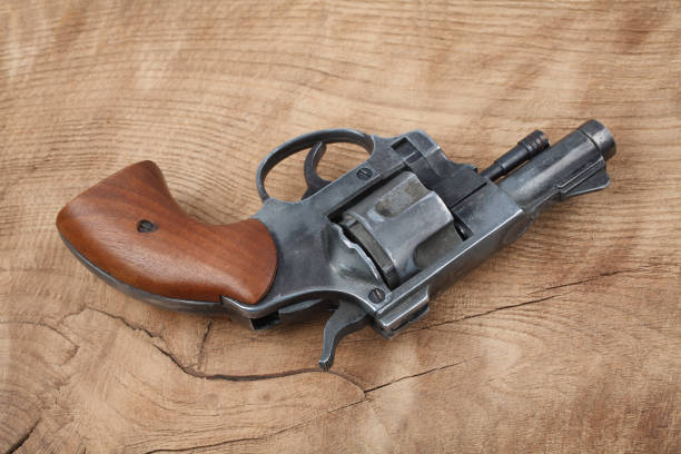 istock Revolver on the wooden table 917458842