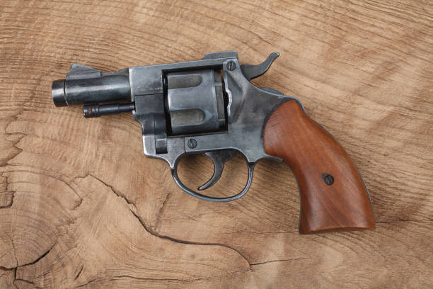 istock Revolver on the wooden table 917458932