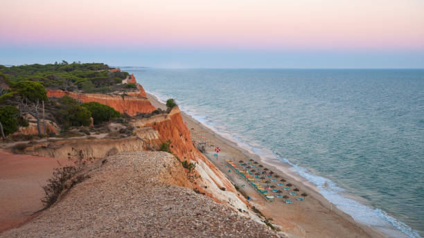 istock Falesia Beach seen from the cliff at dusk 917462158