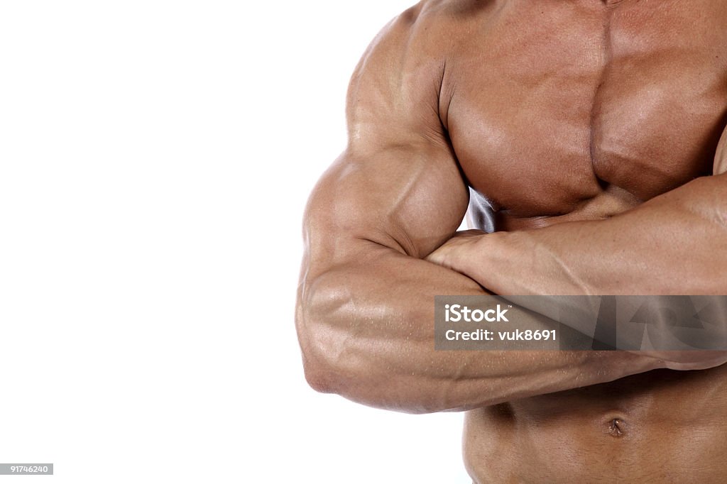 Sin camisa bodybuilder posando - Foto de stock de Abdomen humano libre de derechos