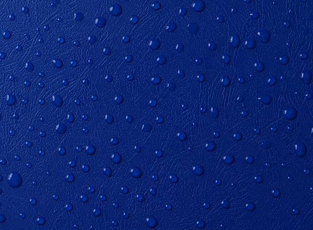 istock Water drops on a dark blue leatherette texture 91746298