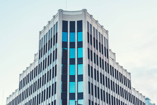 istock modern office corner building with white facade and blue staircase 917464966