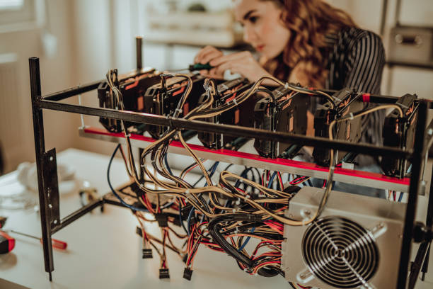 istock Young woman mining bitcoin and other cryptocurrency 917465706