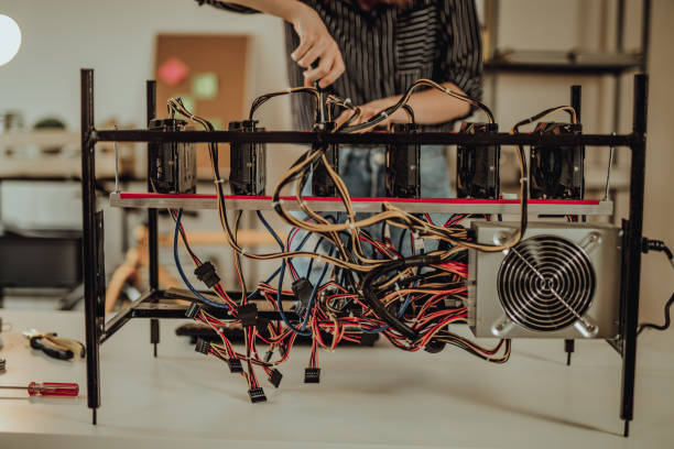 istock Young woman mining bitcoin and other cryptocurrency 917465784