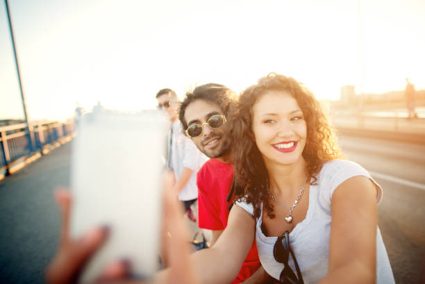 istock Happy, charming couple making selfie in the city. 917465864