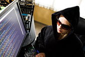 Young female computer programmer as hacker