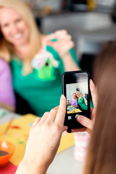 istock Mother and daughters crafting Easter decorations at home. 917468788