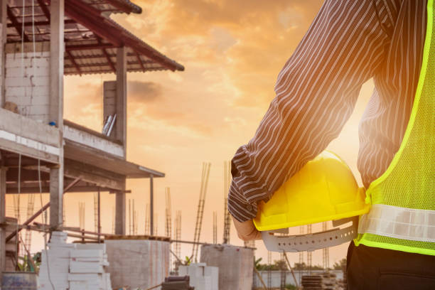 istock Asian business man construction engineer worker at house building site 917471520
