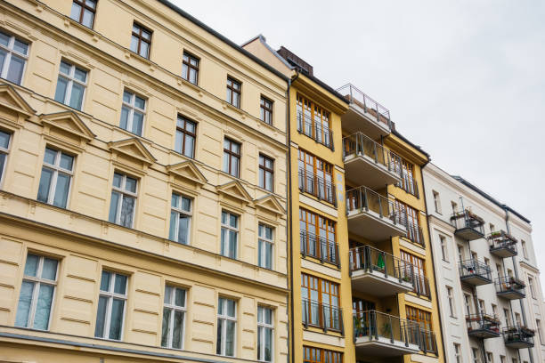 istock yellow and white apartment houses in germany 917472400