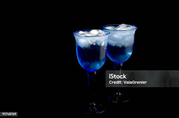 Two Blue Water Glasses On Black Background Stock Photo - Download Image Now - Blue Glass, Black Background, Blue