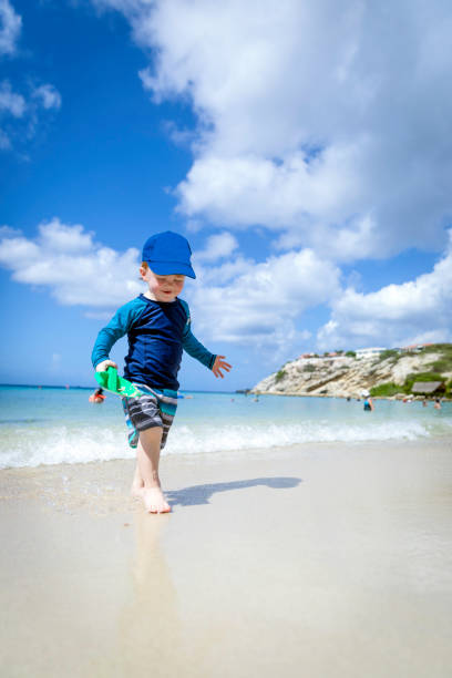 istock Baby Boy Playing on Caribbean Tropical Beach, Curacao 917499512