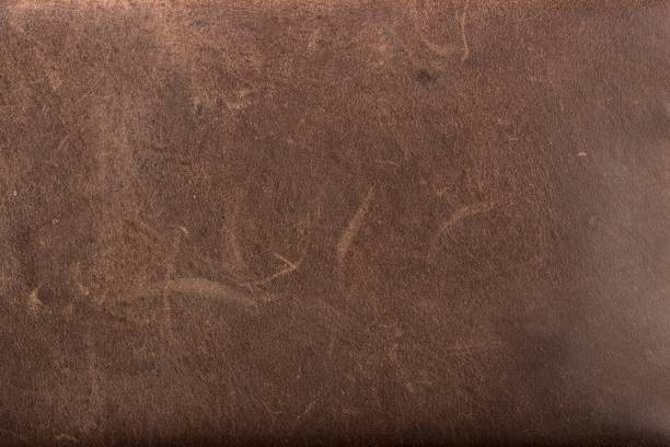 istock brown leather texture close up may used as background . 917511732