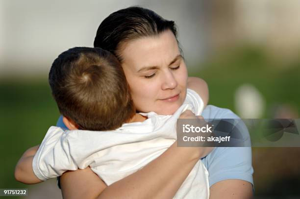 Mother Hugging Her Son Tightly Stock Photo - Download Image Now - Family, Reconciliation, 4-5 Years