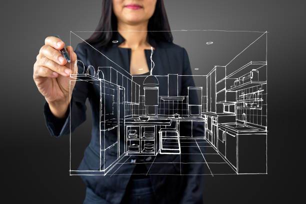 Businesswoman (Architect / Interior designer) drawing on modern futuristic virtual screen stock photo