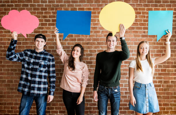 istock Friends holding up copy space placard thought bubbles 917522664