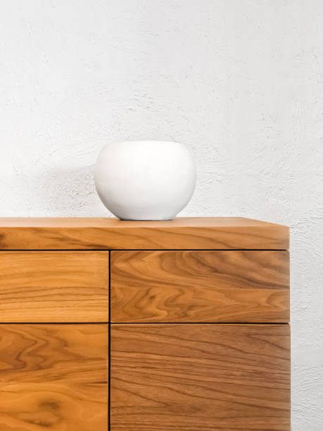 istock Simple ceramic vase decorating a chest of drawers 917522748