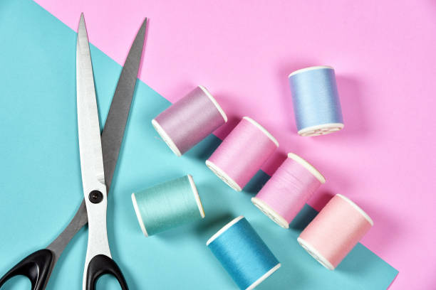 Thread rolls, Group of colorful thread on sewing desk, Craft, sewing and needlework concept. Thread rolls, Group of colorful thread on sewing desk, Craft, sewing and needlework concept. sewing thread rolled up creation stock pictures, royalty-free photos & images