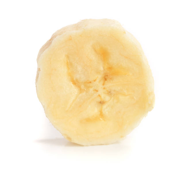 istock Banana slice isolated on a white background. Flat lay, top view 917525262