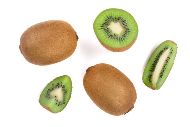 istock sliced kiwi fruit isolated on white background. Flat lay pattern. Top view 917528940