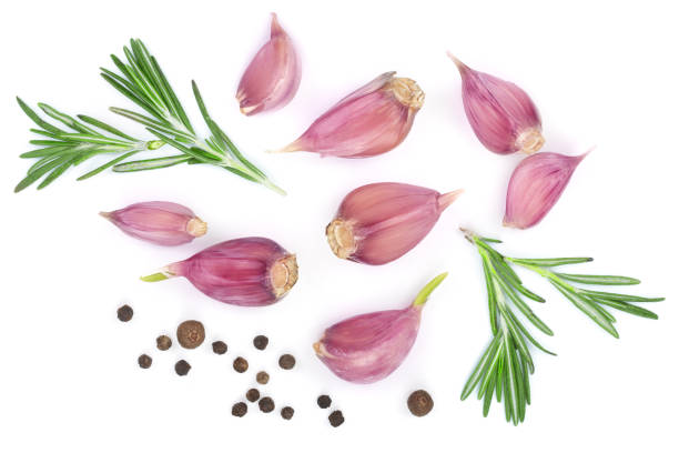 istock garlic with rosemary and peppercorn isolated on white background. Top view. Flat lay pattern 917531710